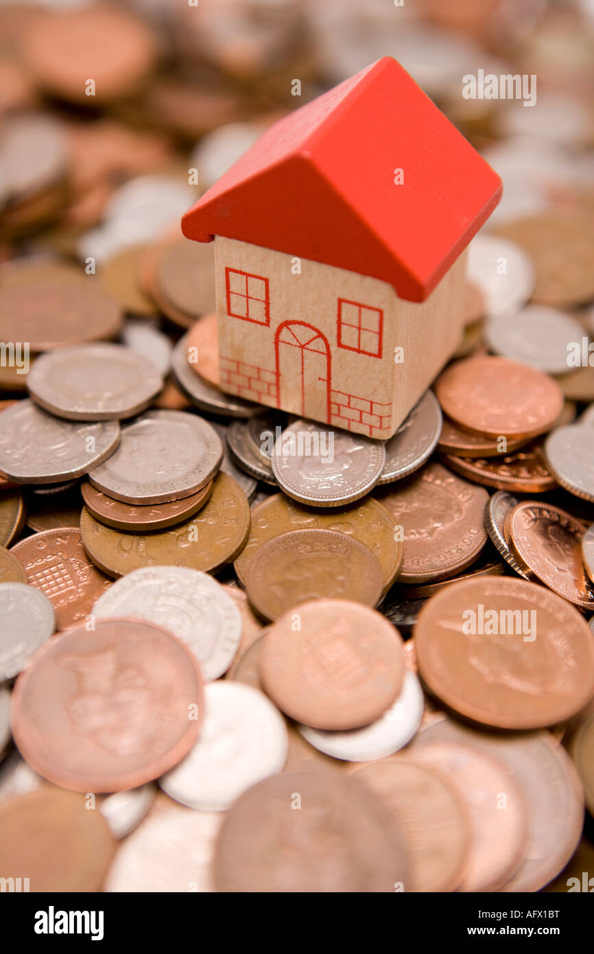 Money for investing in properties house and housing bricks and mortar in the UK Stock Photo