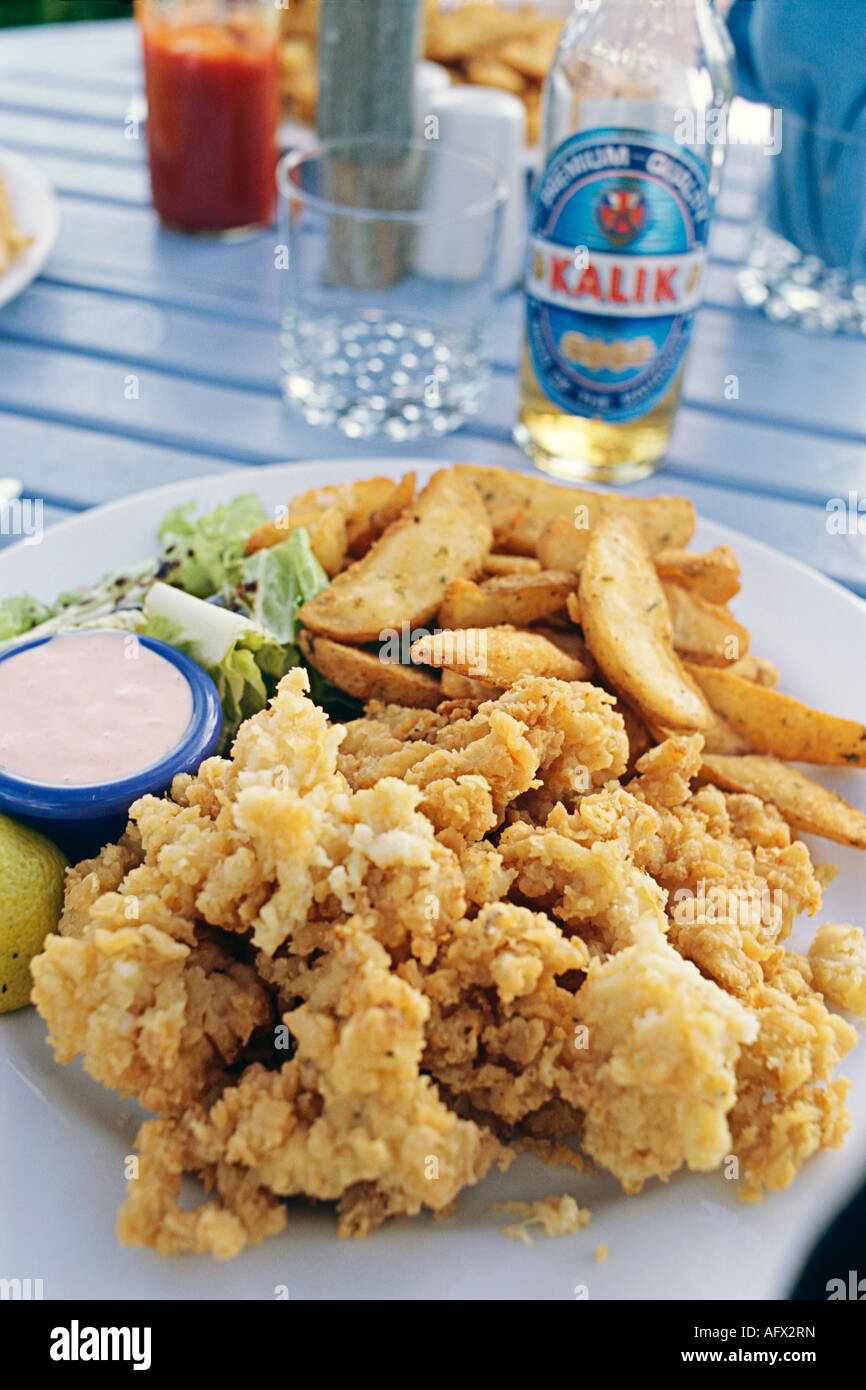 Cracked conch dinner at a restaurant in Harbour Island Bahamas Stock ...