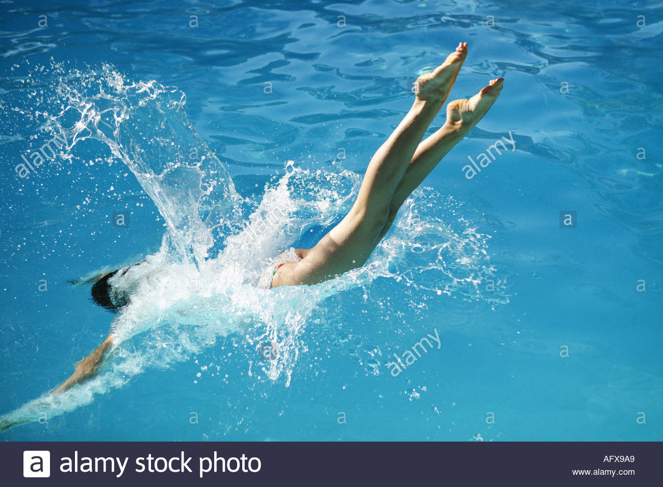 Woman Diving Swimming Pool Splash Stock Photos & Woman Diving Swimming Pool Splash Stock Images