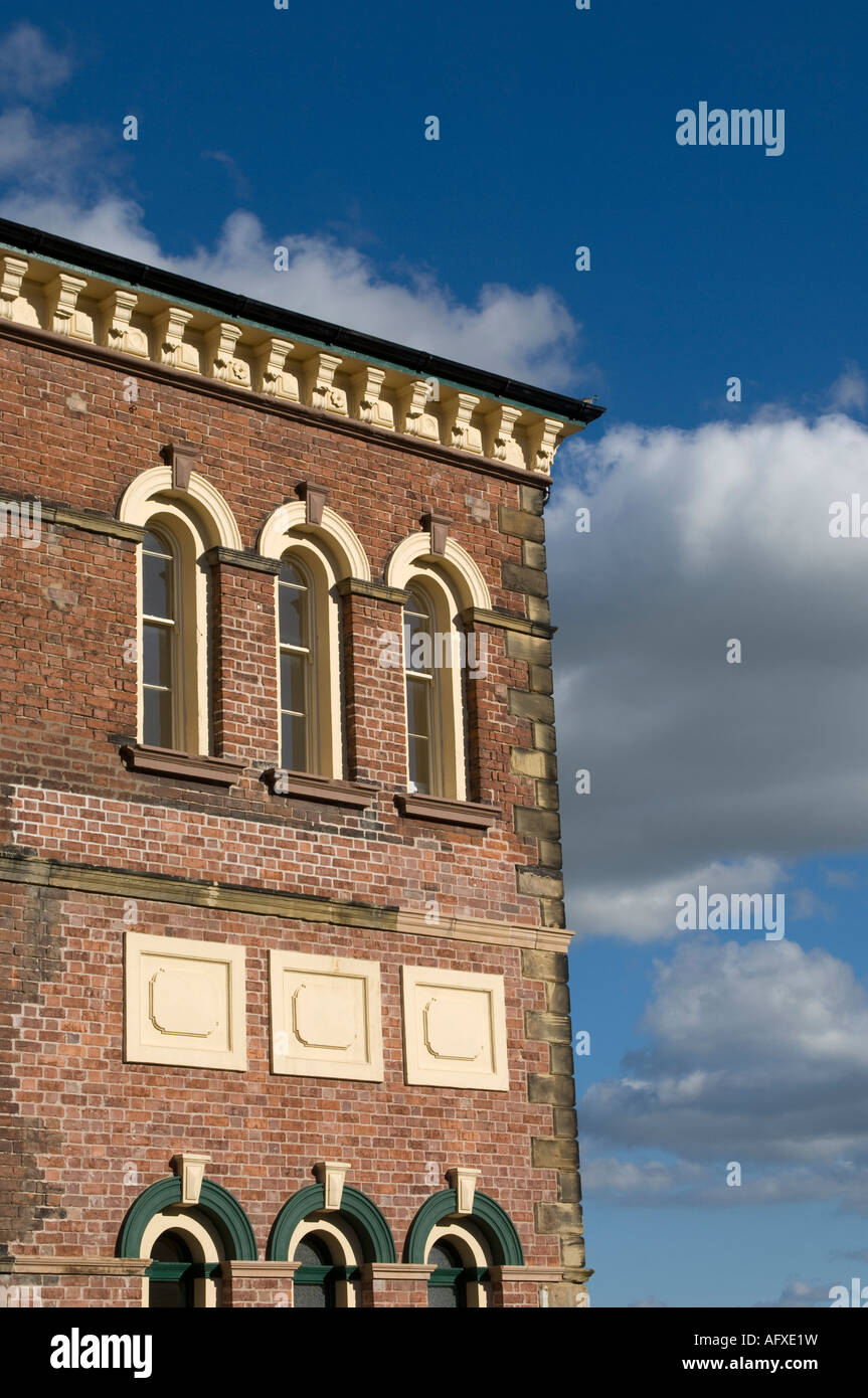 Cambrian Visitor centre Oswestry town Shropshire England - detail of brickwork and windows on corner of building evening Stock Photo