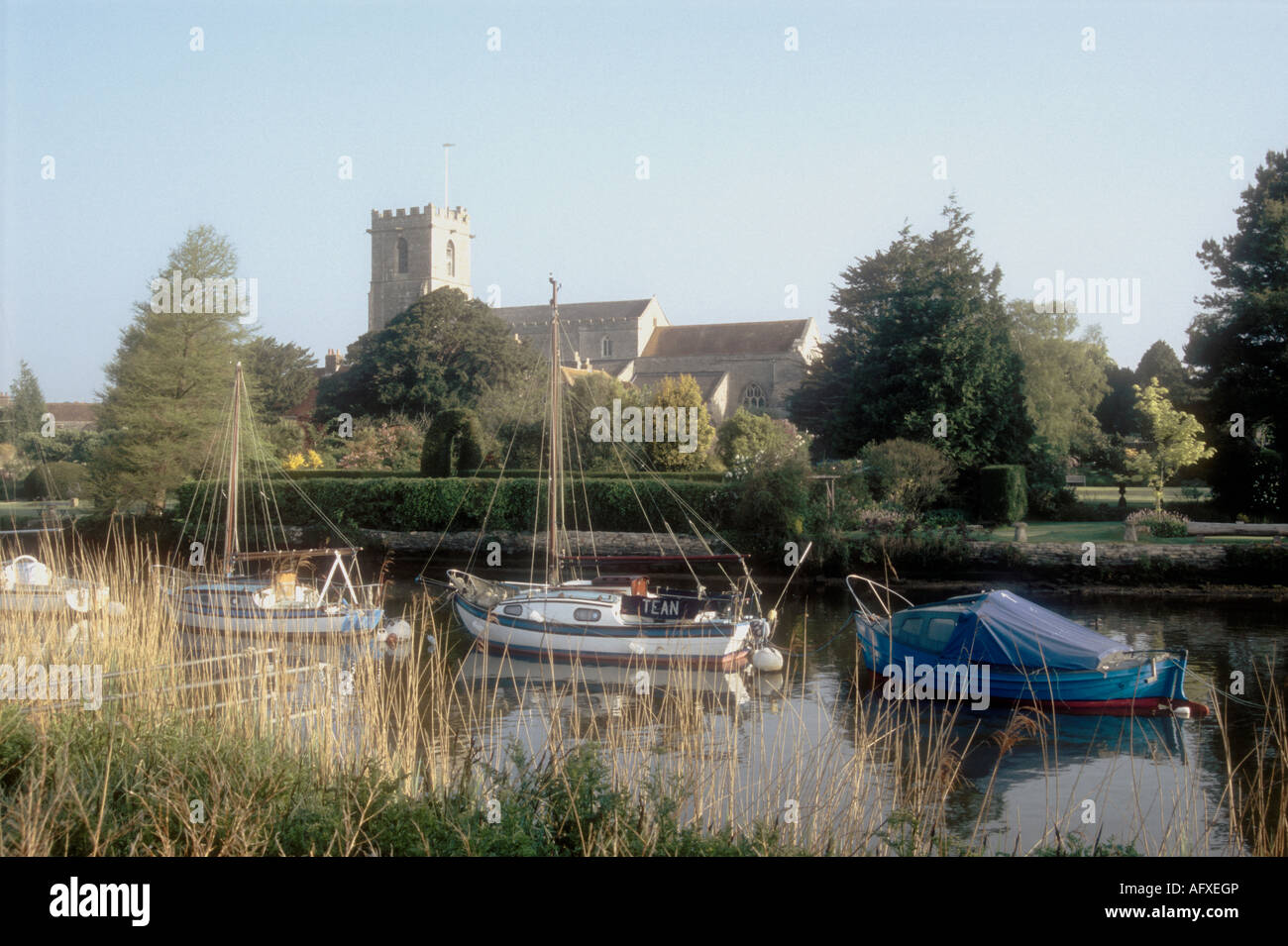 Boats moored on the River Frome at the Wareham Channel in Dorset, England, UK Stock Photo