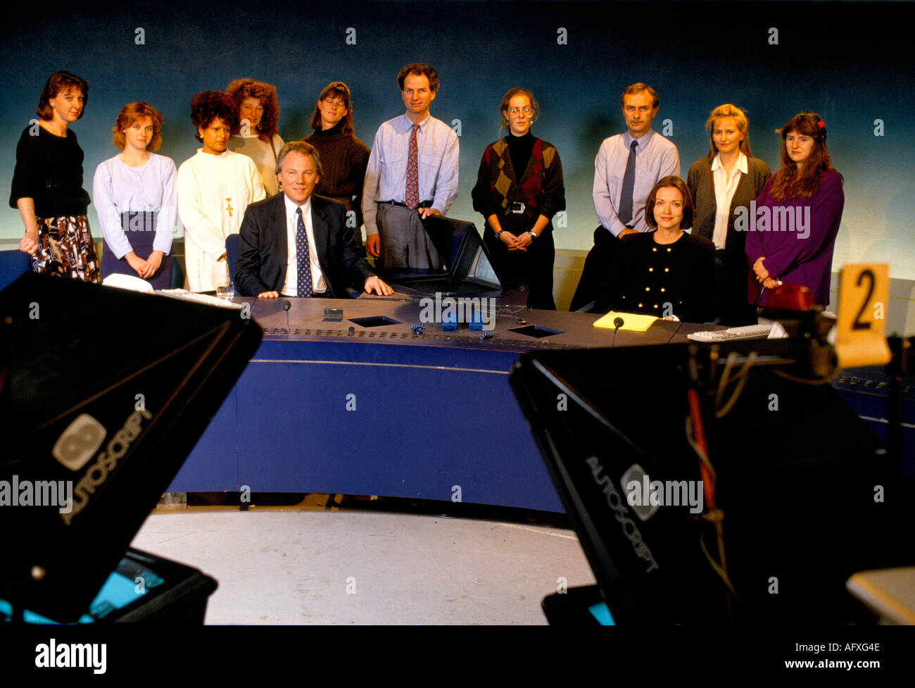 Peter Sissons and Anna Ford British Television News BBC TV presenters in the studio of News at 6 pm 1980s circa 1985 LOndon England UK HOMER SYKES Stock Photo