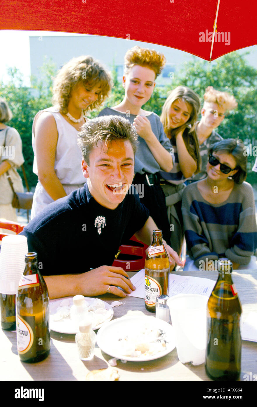 Teenage girl fans groupies with Mark O'Toole from British band Frankie Goes To Hollywood. Munich Germany 1983 1980s. German TV show Popcorn. HOMER SYK Stock Photo