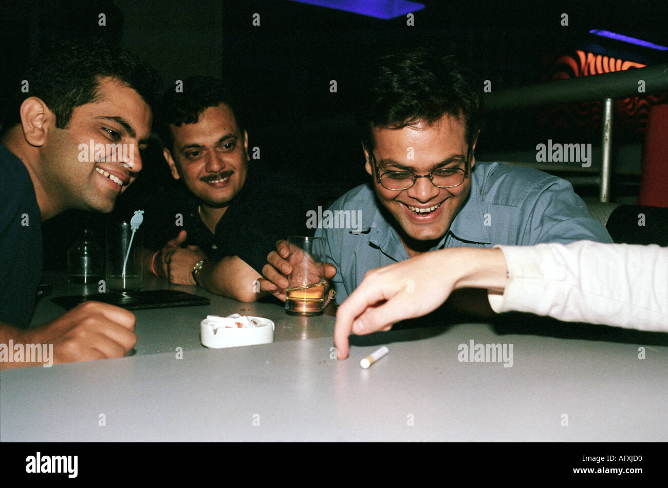 A group of young Indian programmers enjoy a night out Stock Photo