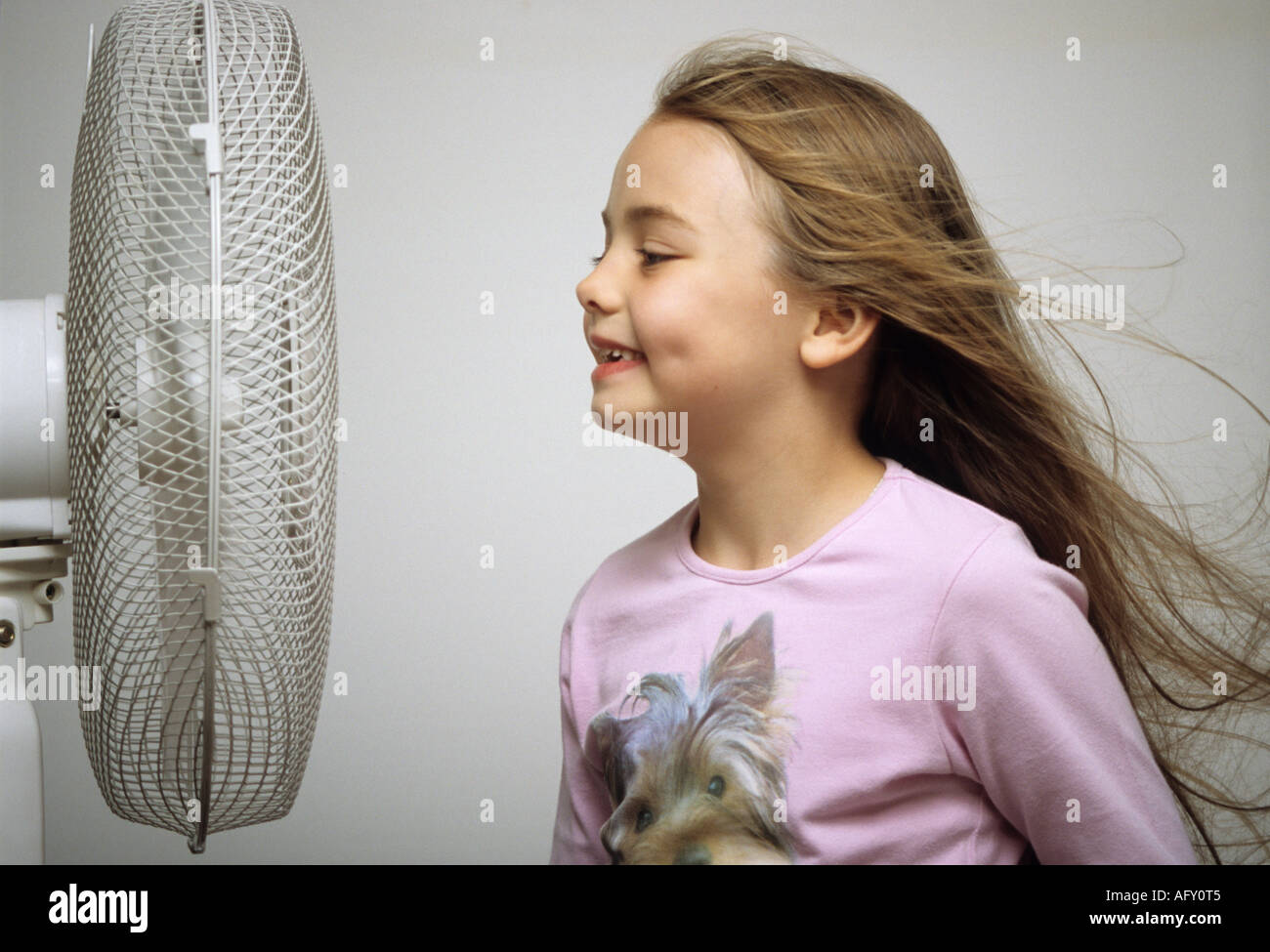 Fan blowing hair hi res stock photography and images Alamy