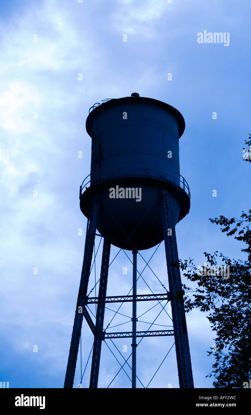 Water tower against dark sky Stock Photo