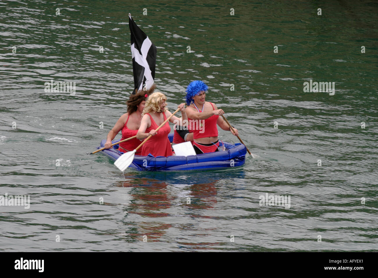 Charlestown regatta Cornwall raft race baywatch babes in drag Stock ...