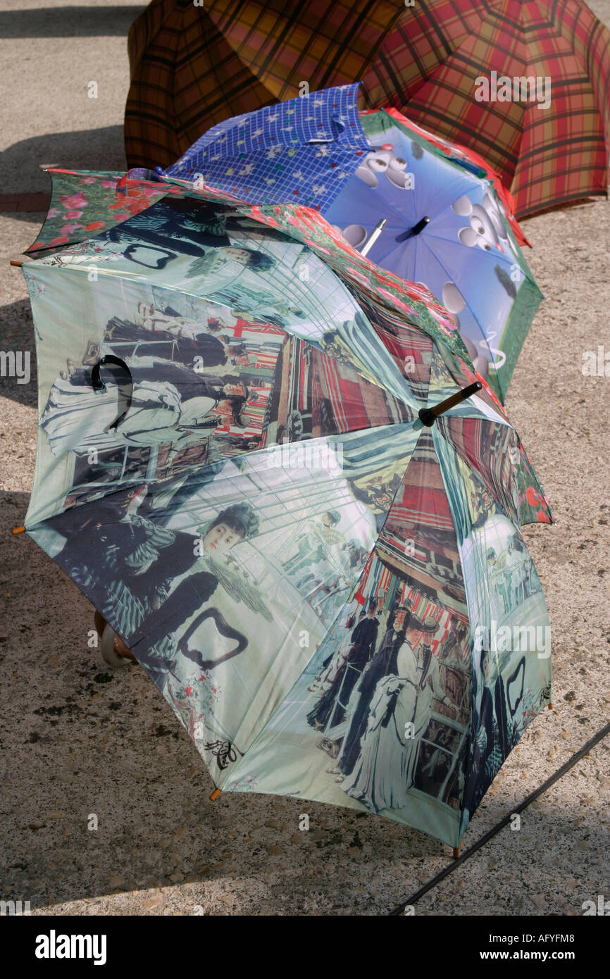 Stock photograph of umbrellas in street market France Stock Photo - Alamy