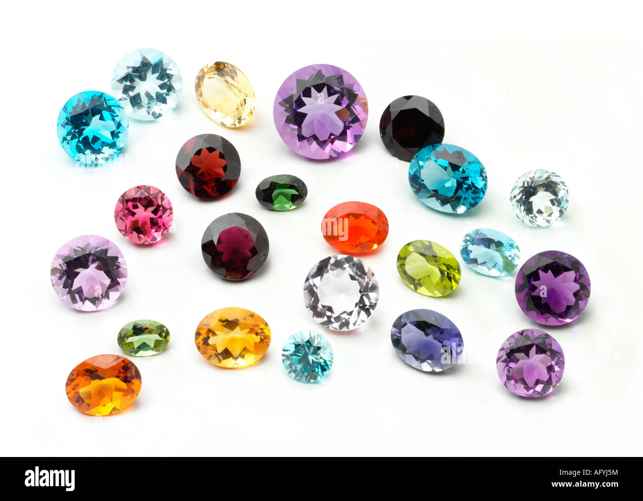 Group of different coloured gem stones on a white background Stock Photo