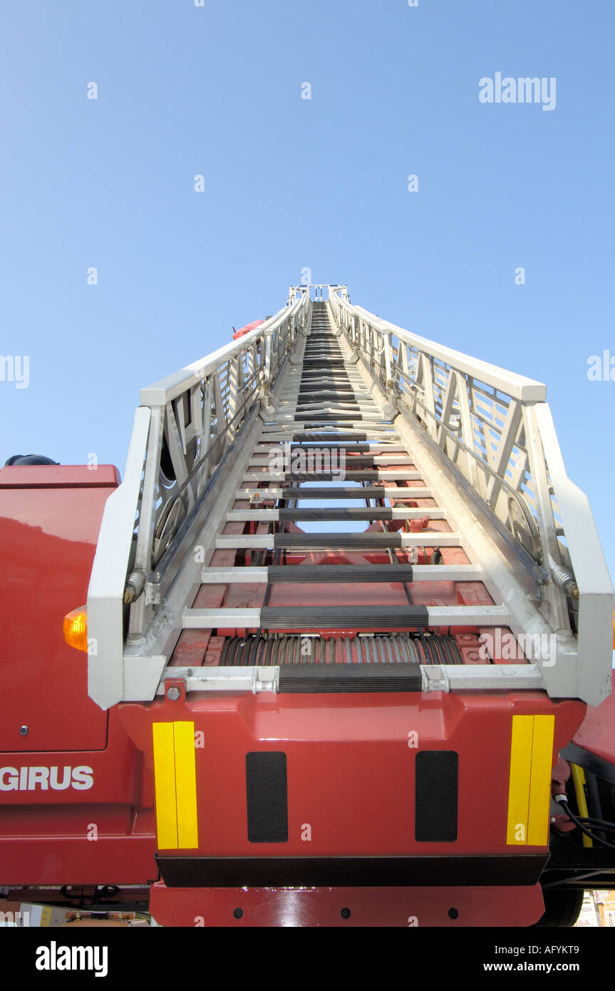 Fireman operating the ladder controls of the fire truck Stock Photo - Alamy