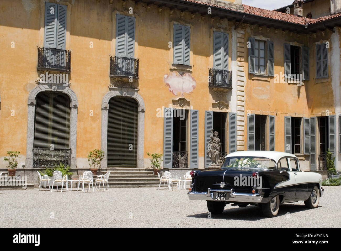 Classic Italian villa style and oldsmobile 98 Stock Photo