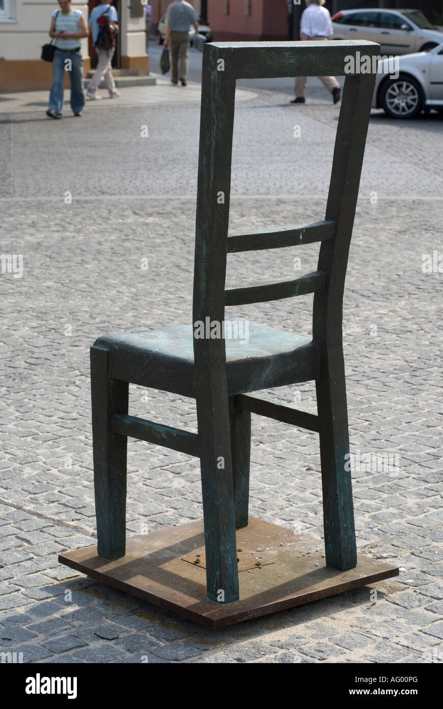 Holocaust memorial sculpture of empty chair in square in Podgorze