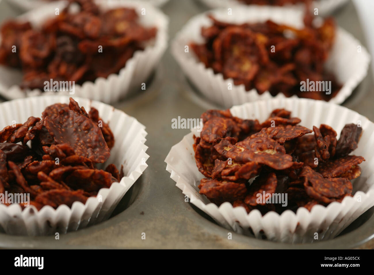 chocolate crispy cake or chocolate cornflake nest or chocolate cup cake ...
