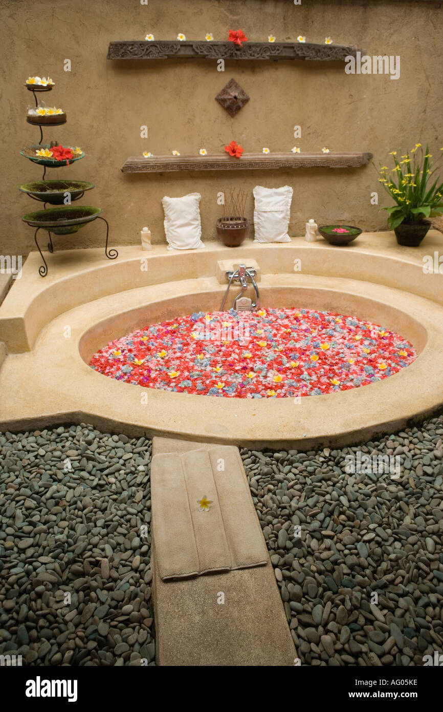 Bath filled with flower petals Stock Photo Alamy