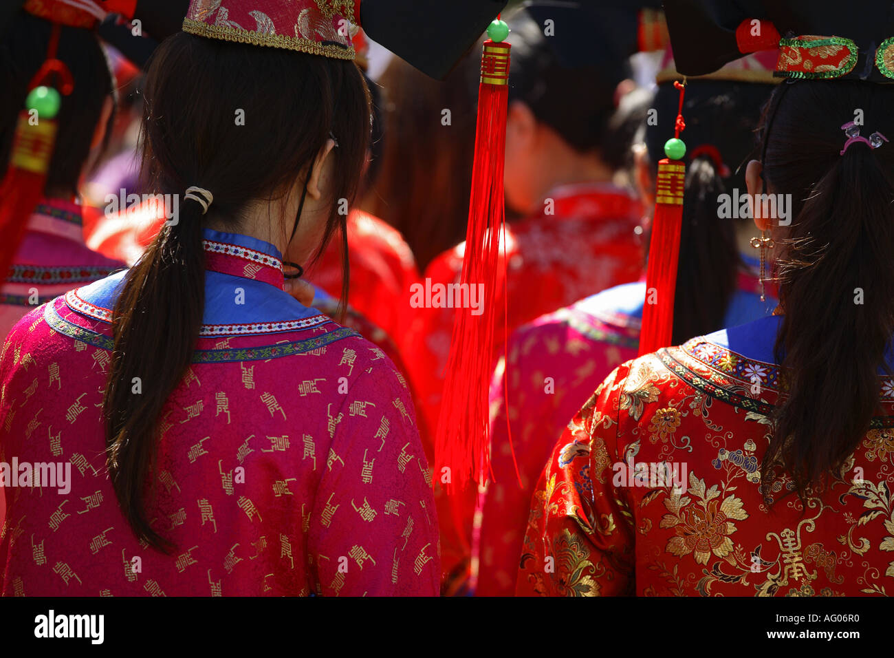 Chinese girls dressed in traditional costumes Stock Photo - Alamy