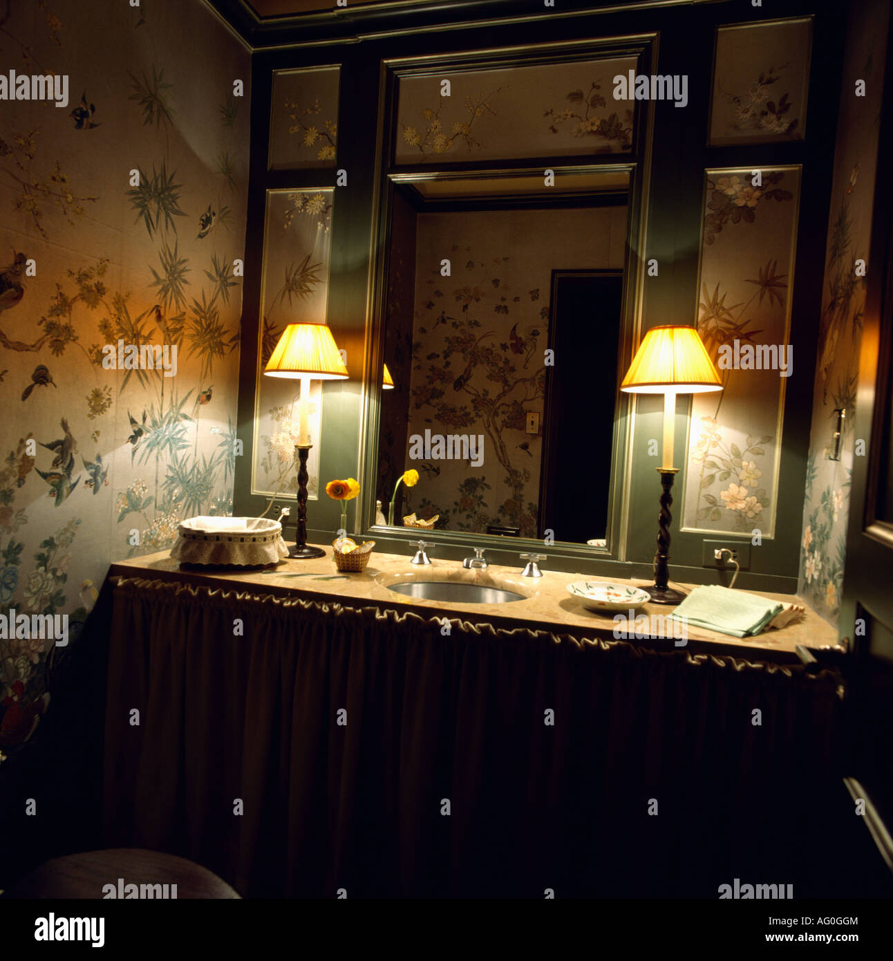 Lighted Lamps On Vanity Unit In Dark Corner Of Bathroom With Stock