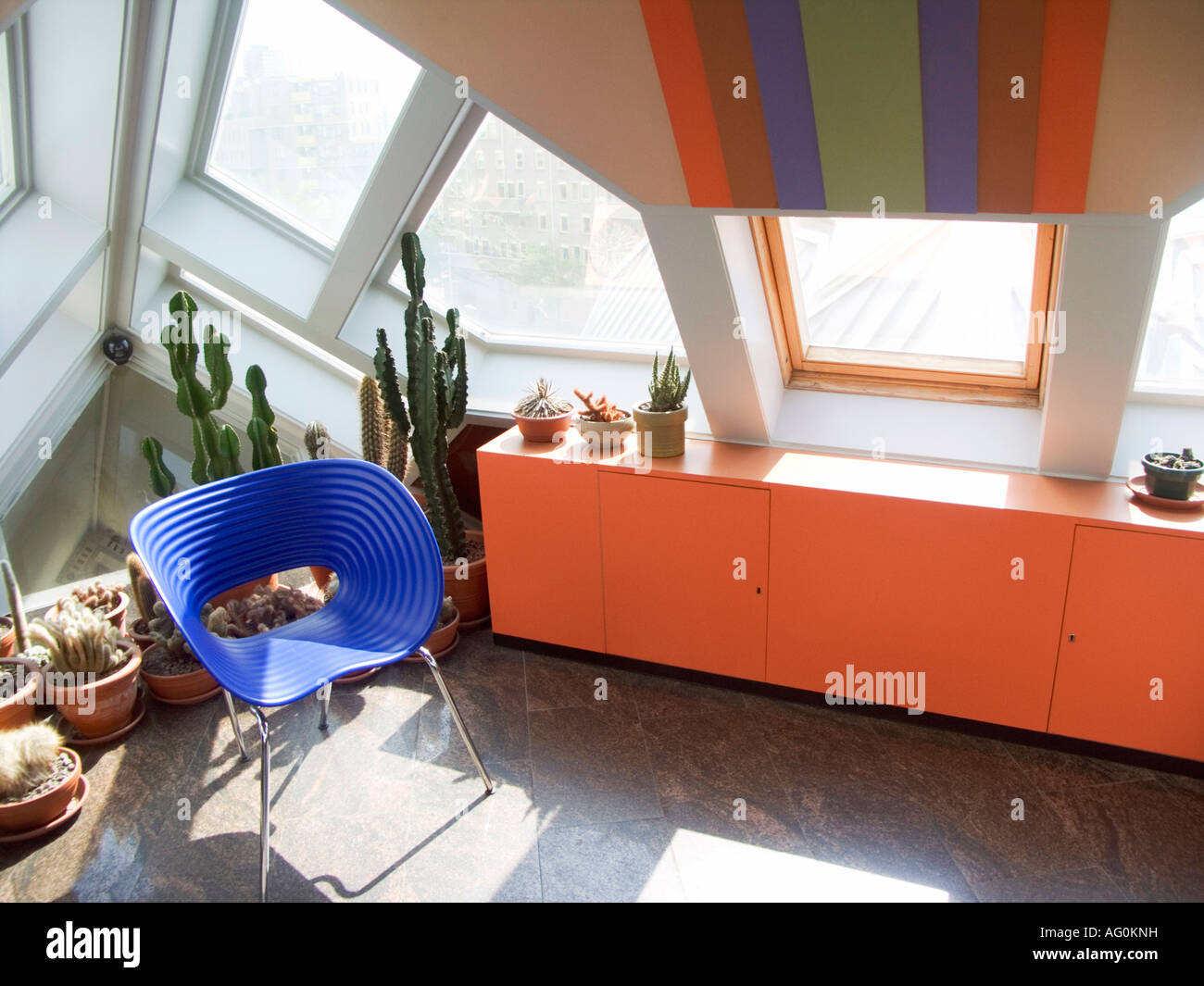 Residents inside a Cube House with custom furniture