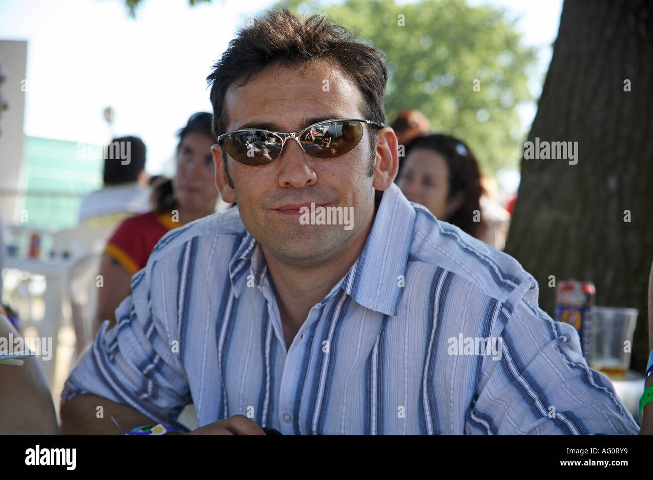 Man in sunglasses at Guilfest Music Festival. Guildford, Surrey, England Stock Photo