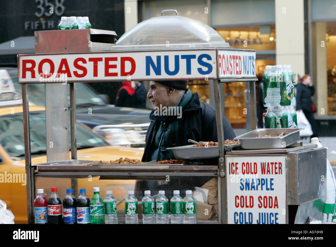 middle eastern origin street vendor selling roasted nuts and soft