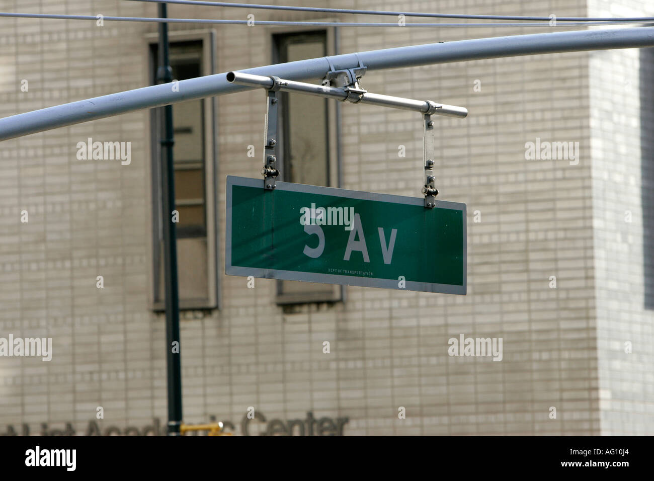 5th avenue ave road traffic sign hanging from overhead pole new york city new york USA Stock Photo