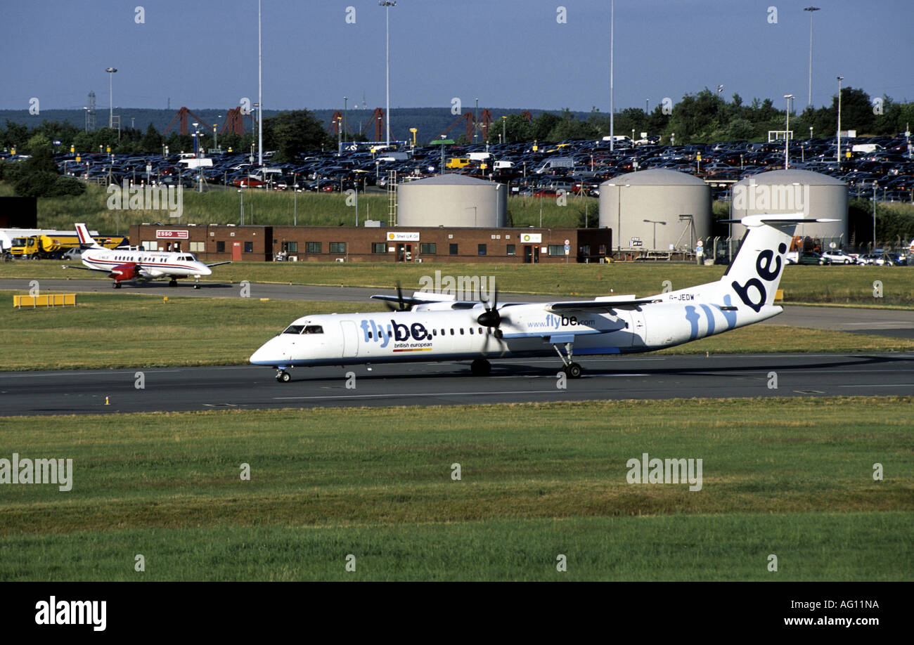 flybe DHC Dash Eight aircraft waiting to take off at Birmingham International Airport, West Midlands, England, UK Stock Photo