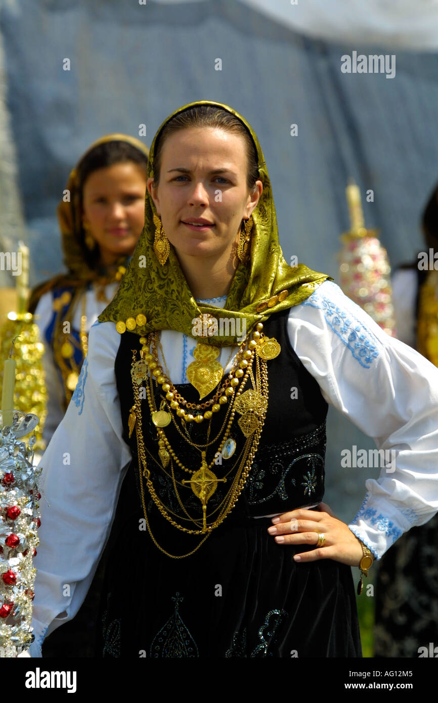 Girl with traditional dress and gold necklaces and jewelery, Minho, Portugal Stock Photo