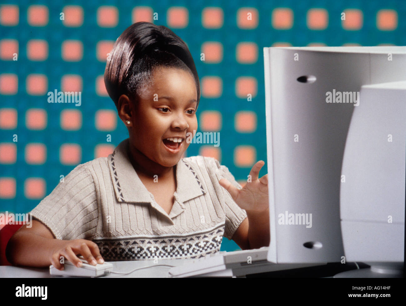 Little girl with computer Stock Photo - Alamy