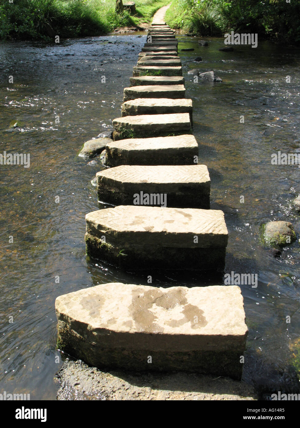 Stepping stones across the river Esk at Leaholm, North Yorkshire, England, UK. Stock Photo