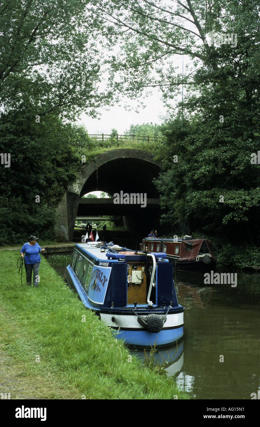 Grand Union Canal Northampton Arm at Rothersthorpe Locks by M1 motorway underpass, Northamptonshire, England, UK Stock Photo