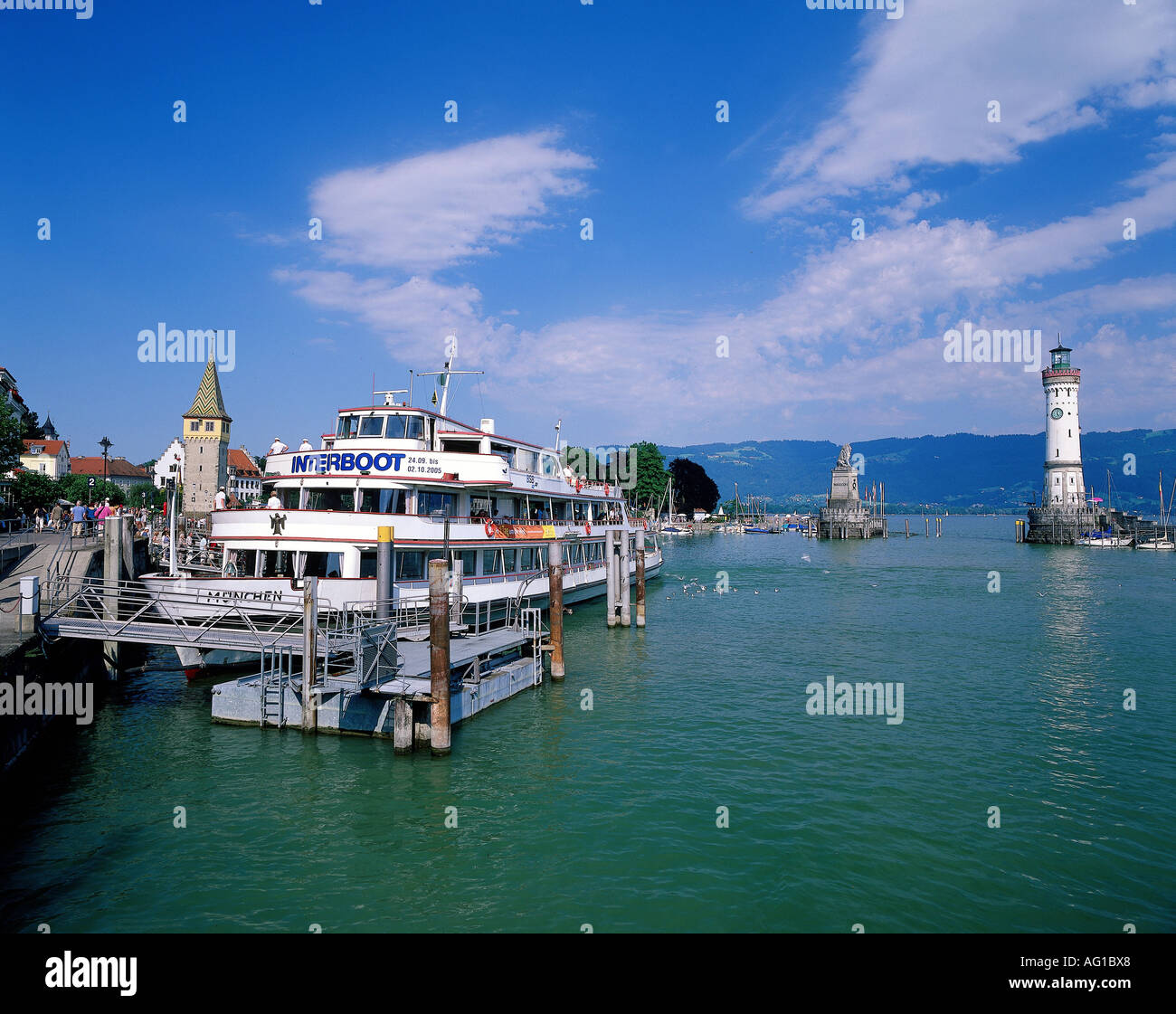 geography / travel, Germany, Bavaria, Lindau, harbour, port entrance, lighthouse, built 1856, Bavarian Lion, Mangturm, built 1230, Lake Constance, ship, Additional-Rights-Clearance-Info-Not-Available Stock Photo