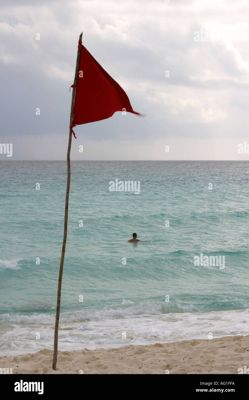 Cancun Mexico Red flag on beach Stock Photo Alamy