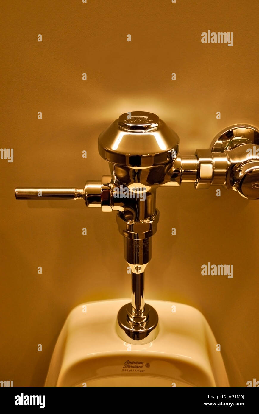 urinal handle in bathroom Stock Photo Alamy