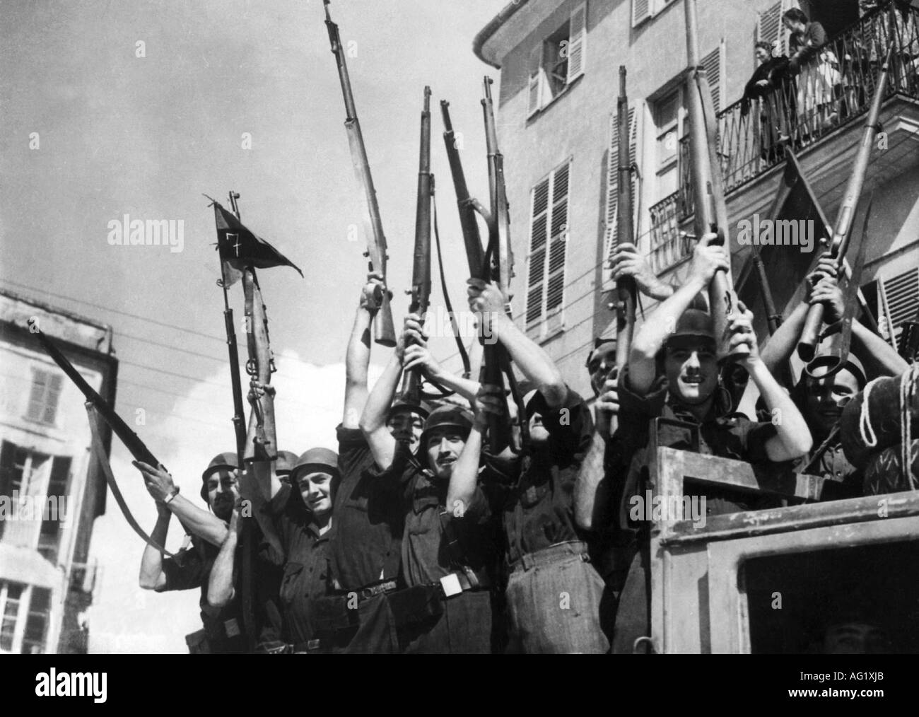 geography / travel, Spain, Spanish Civil War, 1936 - 1939, jubilating Falange members on a truck, Leon, 7.12.1936, weapons, arms, rifles, cheering, militia, Falange Espanola, Phalange, soldiers, nationalist, nationalists, historic, historical, Europe, fascists, male, man, men, people, 1930s, 20th century, Stock Photo