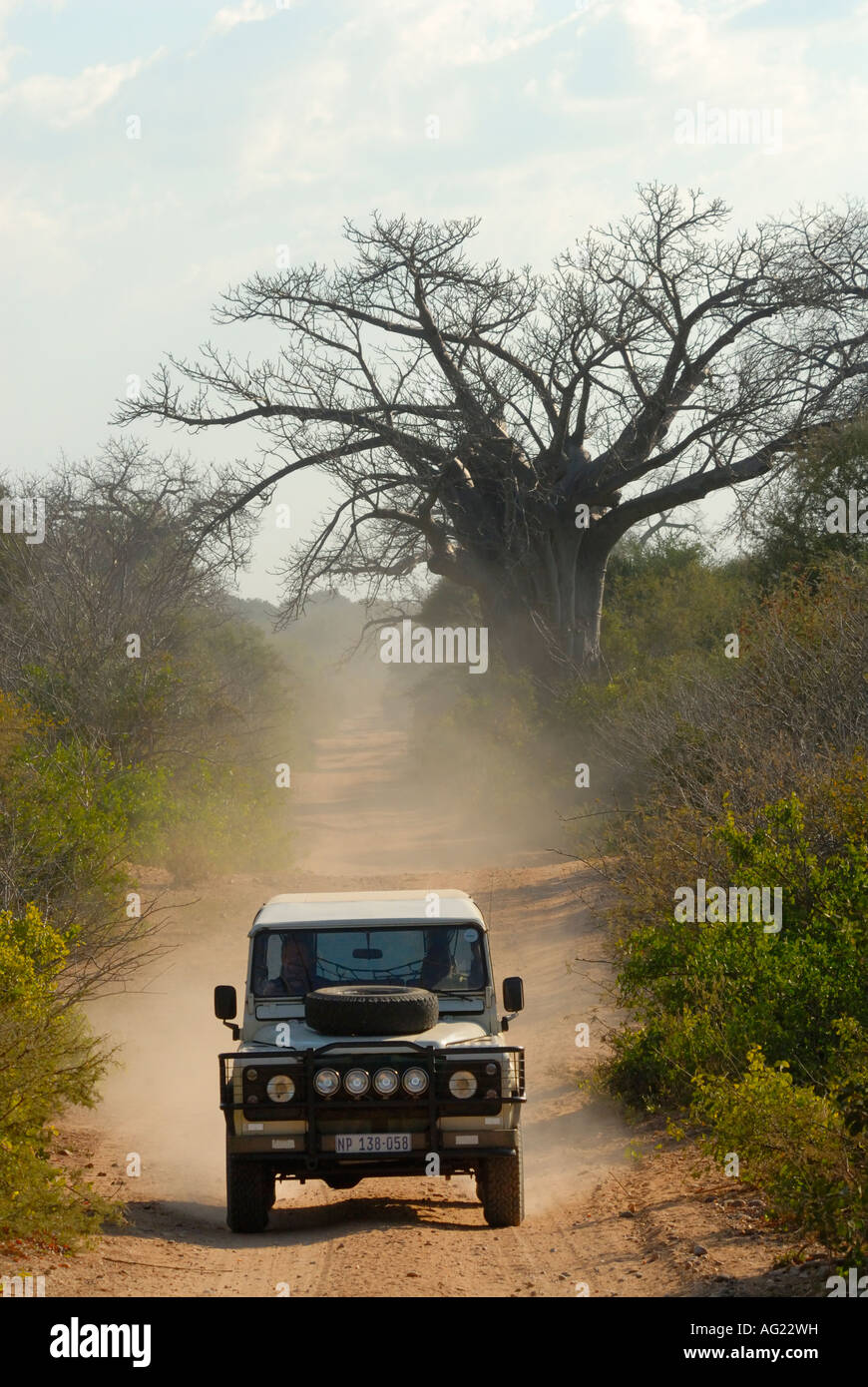 4x4 vehicle travelling on a rural dirt road in Mozambique Stock Photo