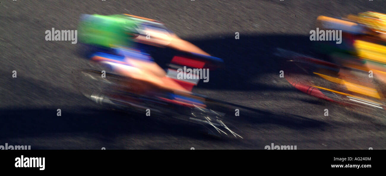 Cyclists compete for line honours towards the end of a race Stock Photo