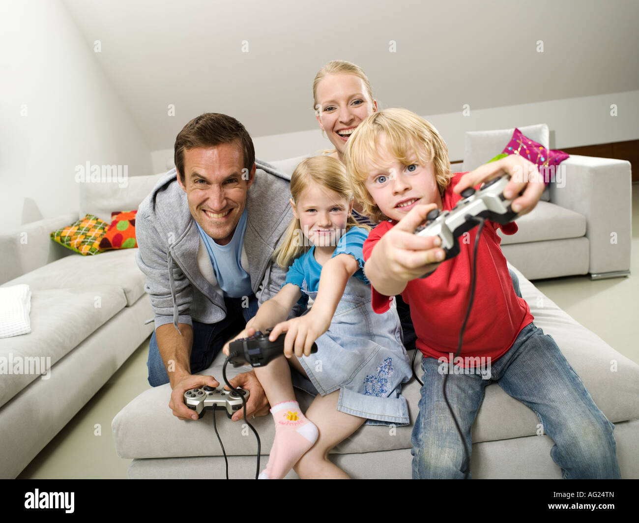 Family playing compouter game Stock Photo