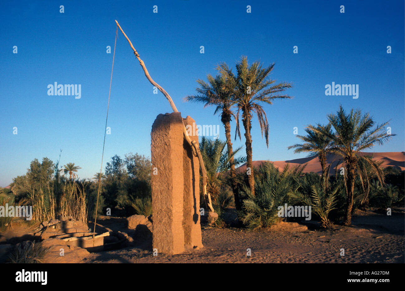 Algeria Taghit Traditional way to pull water from well Stock Photo