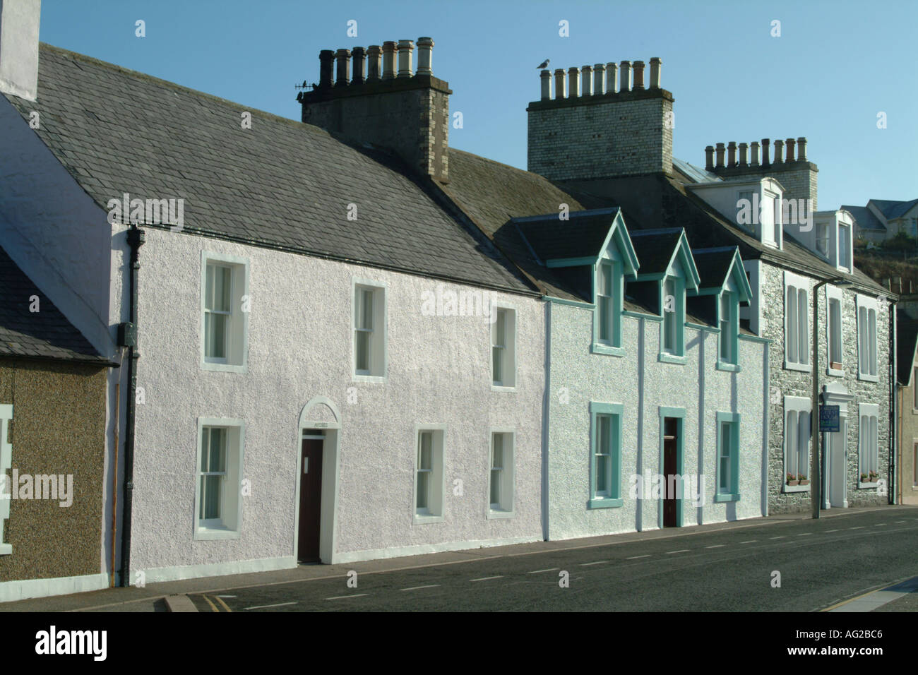 A Terrace Of Pastel Shaded Cottages Portpatrick Galloway Scotland