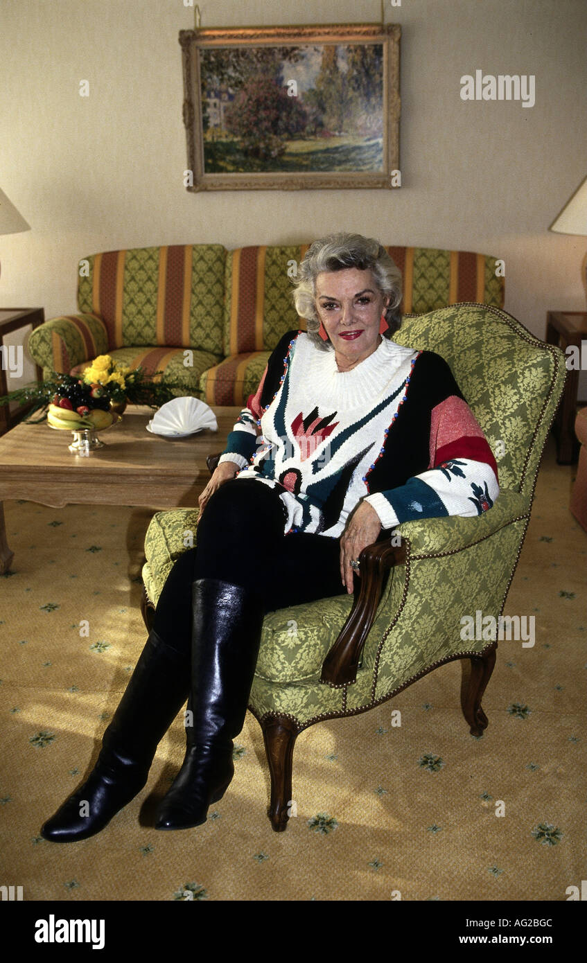 Woman sitting chair full length hi-res stock photography and images - Alamy