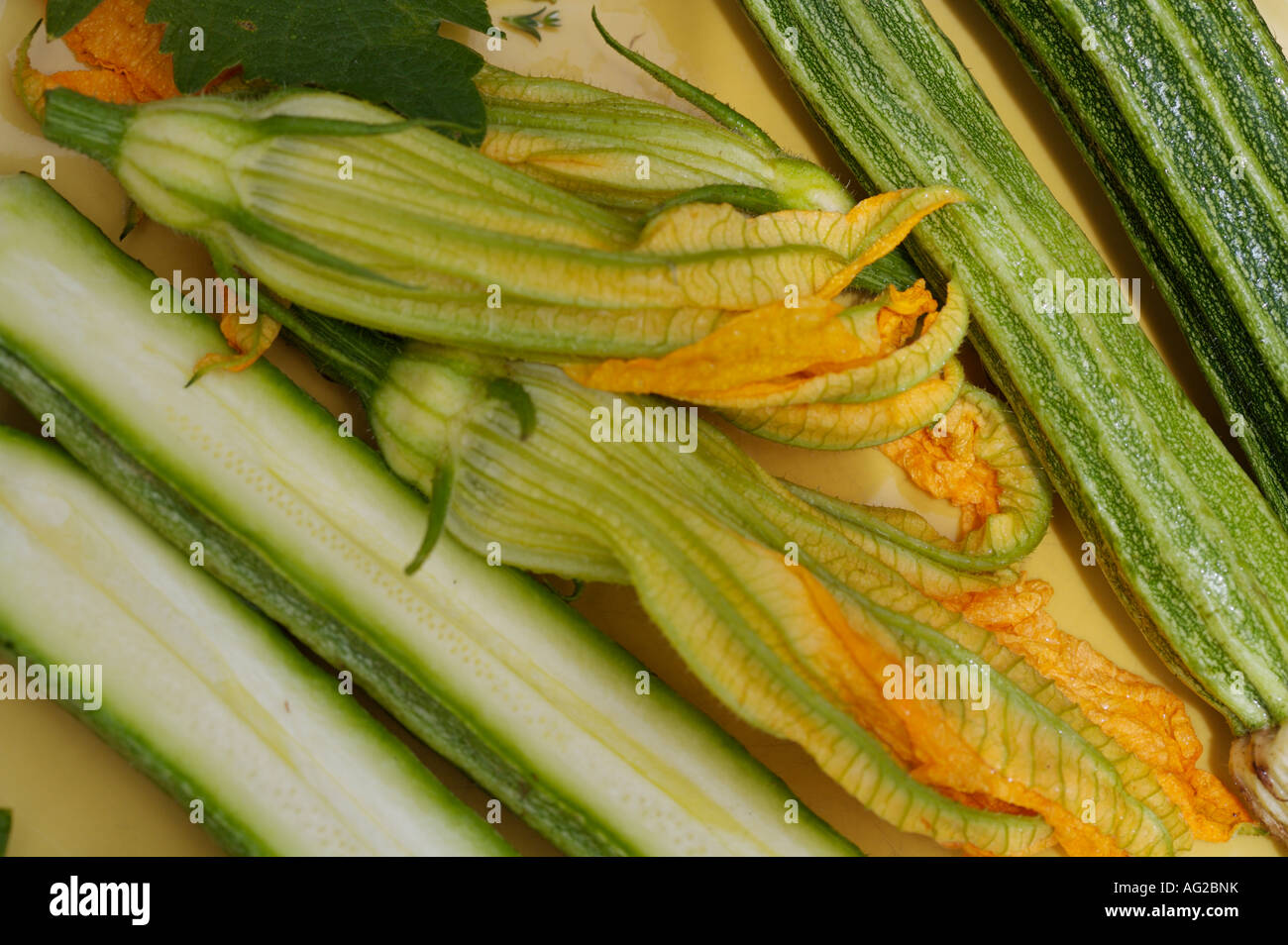 Close up of courgettes with their flowers Stock Photo Alamy