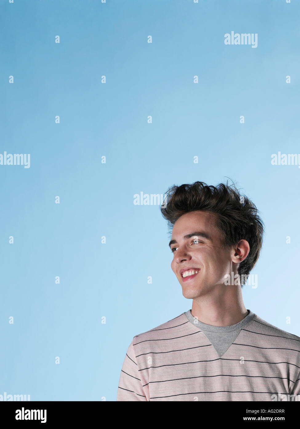 Portrait of smiling young man Stock Photo - Alamy