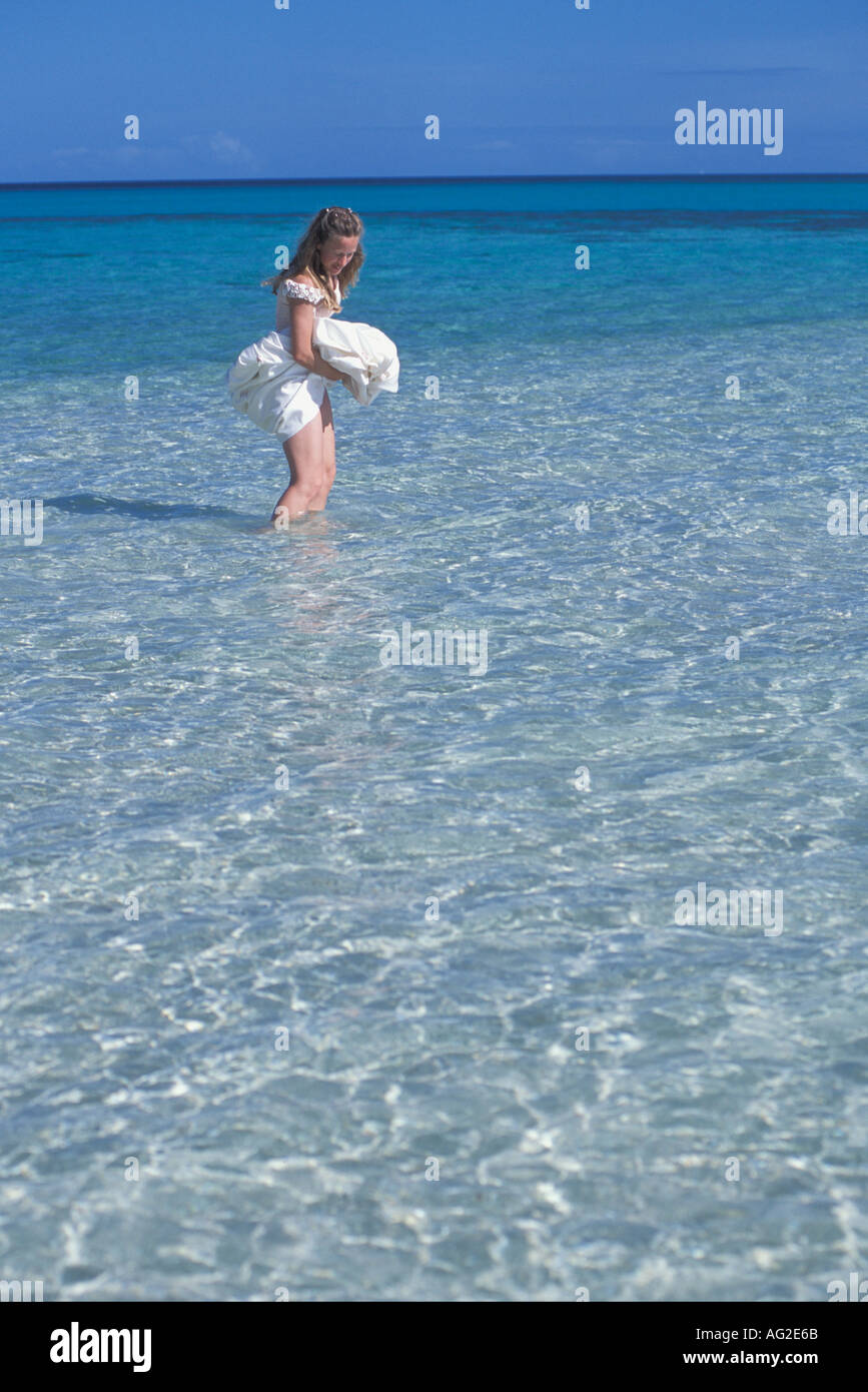 Australia Queensland woman wading in sea MR available Stock Photo