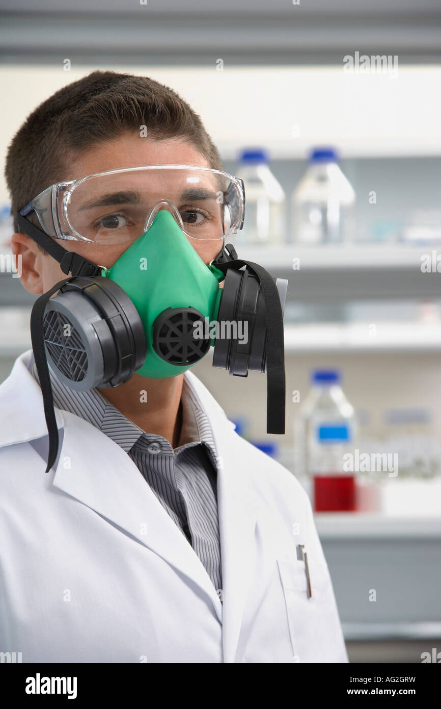 Scientist wearing a gas mask in laboratory Stock Photo Alamy