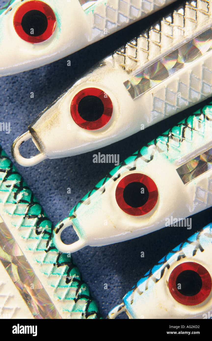Close up of salmon fishing lures with eyes repeating in a pattern Stock Photo