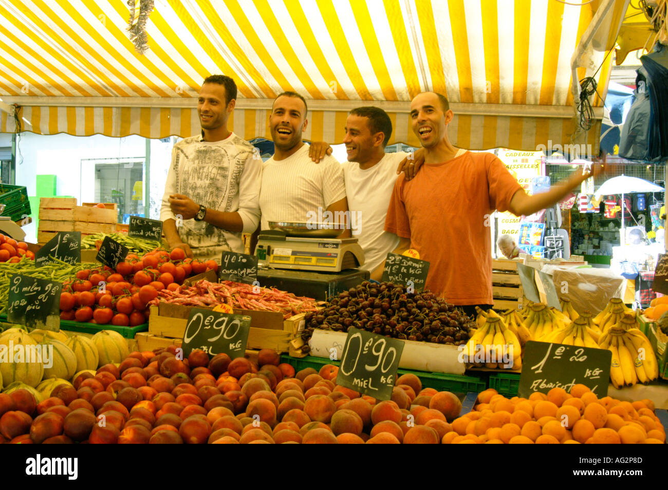 France Marseille Market in Marche des Capucins Noailles Area is heavily Arab as are most vendors like these cheerful types Stock Photo