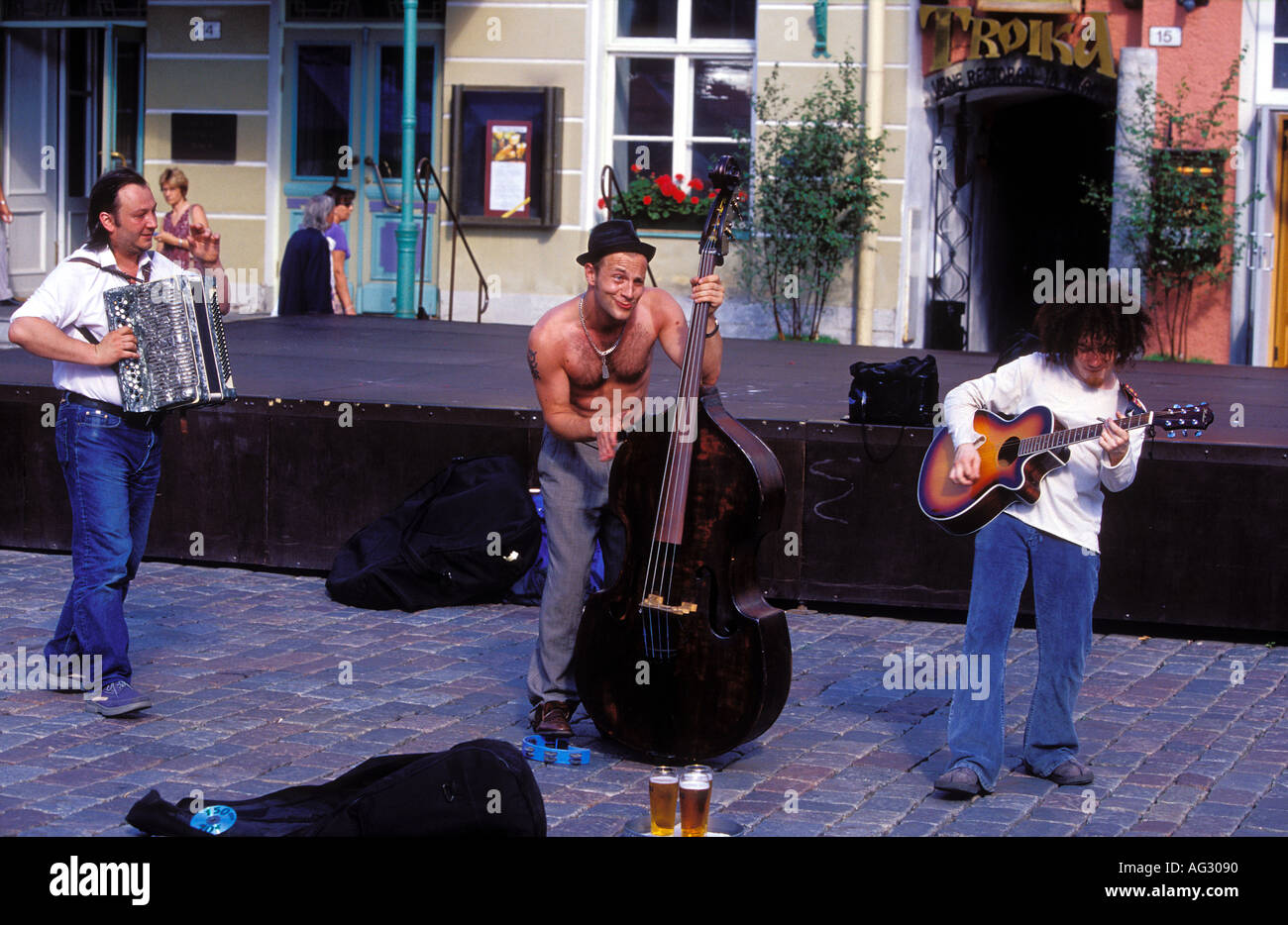 Street musician plays at Tallinn Raekoja Plats Town Hall square Tallinn estonia Stock Photo