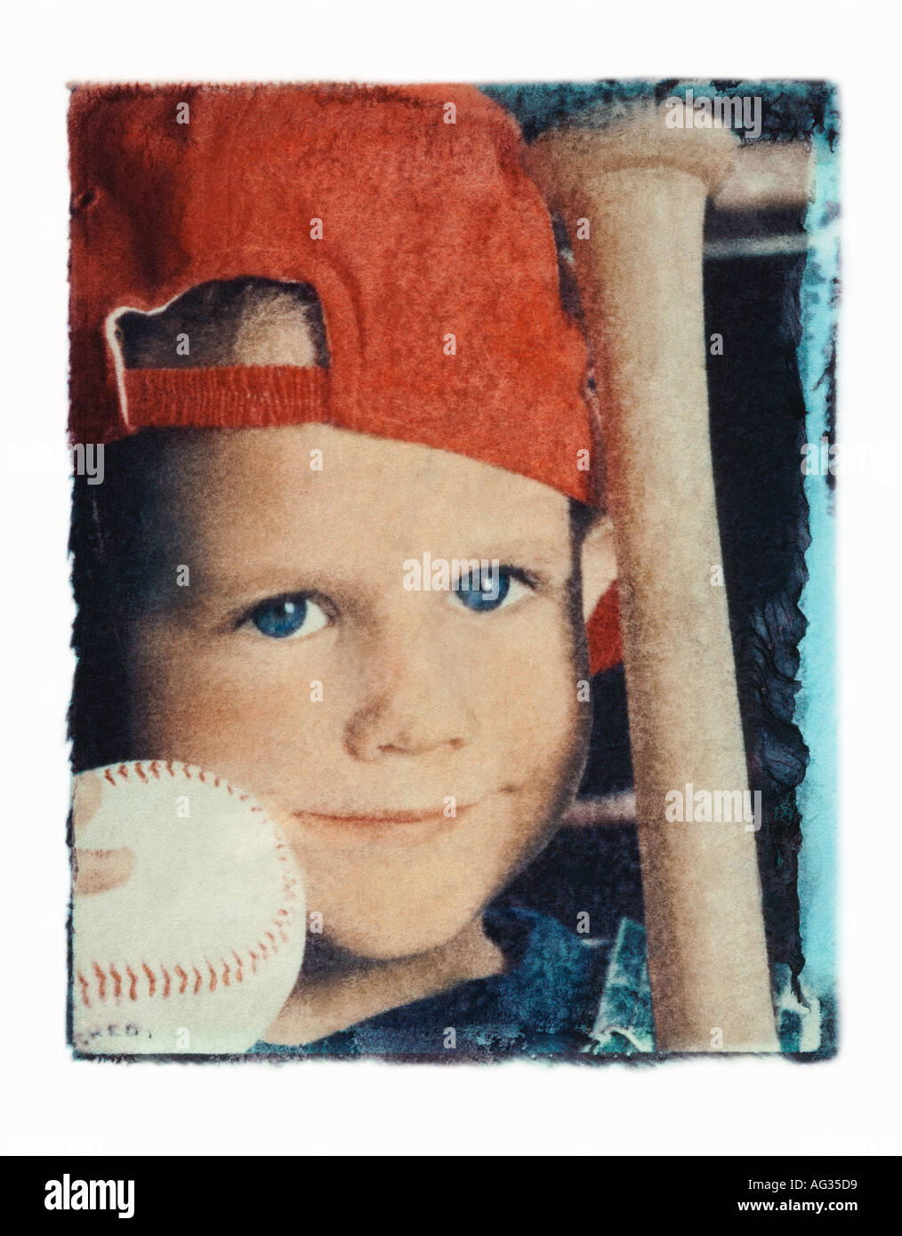 Polaroid transfer portrait of young boy with baseball and bat Stock Photo