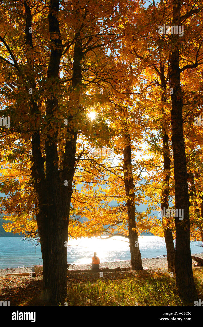 Visitor at Upper Waterton Lake during a sunny Autumn day Waterton Lakes ...