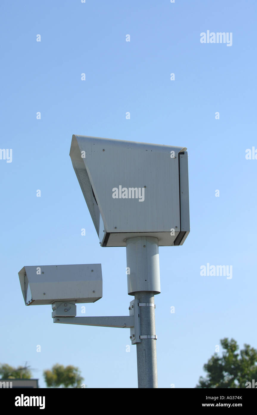 Cameras with associated lighting equipment monitor public road