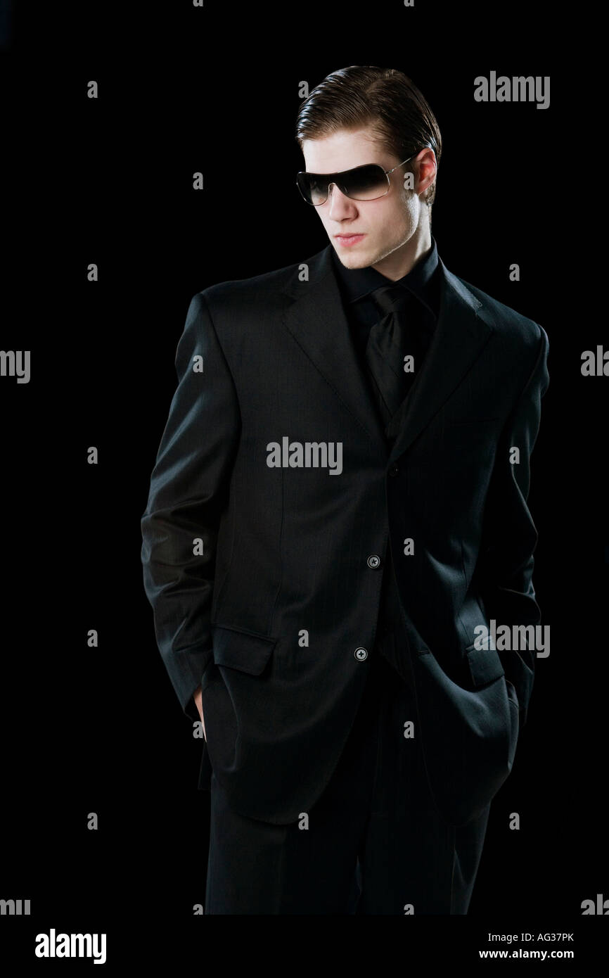 Man wearing a suit and sunglasses Stock Photo - Alamy